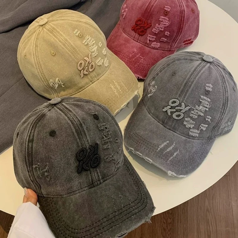Damen Baseballkappe im Used-Look mit Grafikstickerei Skanto