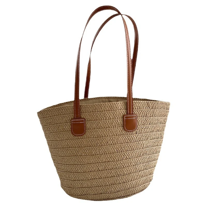 Handgefertigte Strohtasche mit eleganten Ledergriffen Skanto