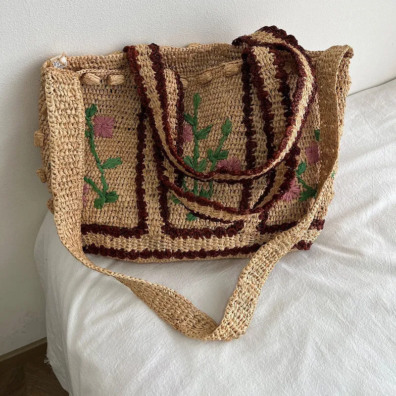 Geflochtene Umhängetasche mit Blumenmuster Skanto