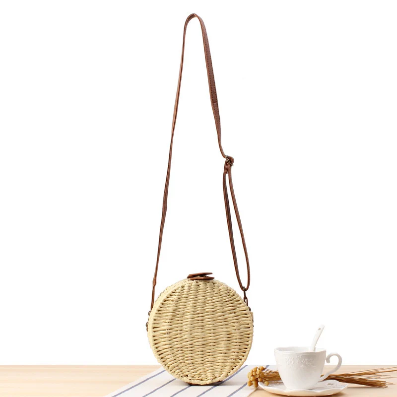 Runde gewebte Tasche mit Lederdetails Skanto
