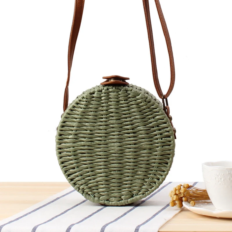 Runde gewebte Tasche mit Lederdetails Skanto