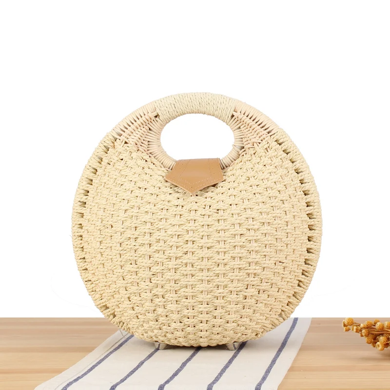 Runde Strohtasche mit elegantem Ledergriff Skanto