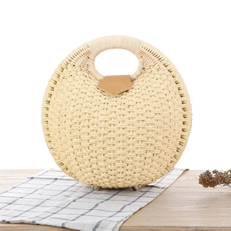Runde Strohtasche mit elegantem Ledergriff Skanto