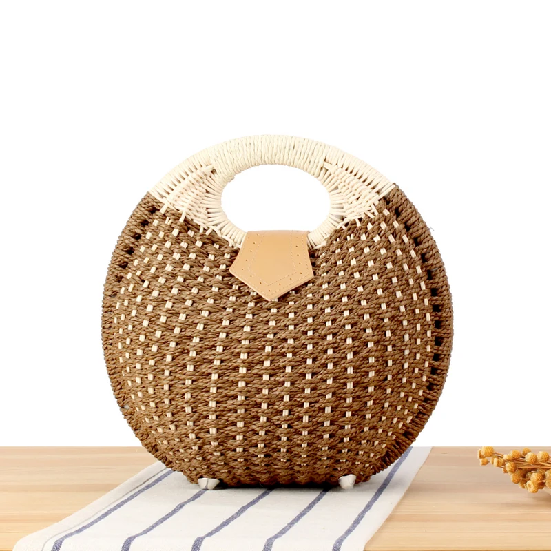 Runde Strohtasche mit elegantem Ledergriff Skanto