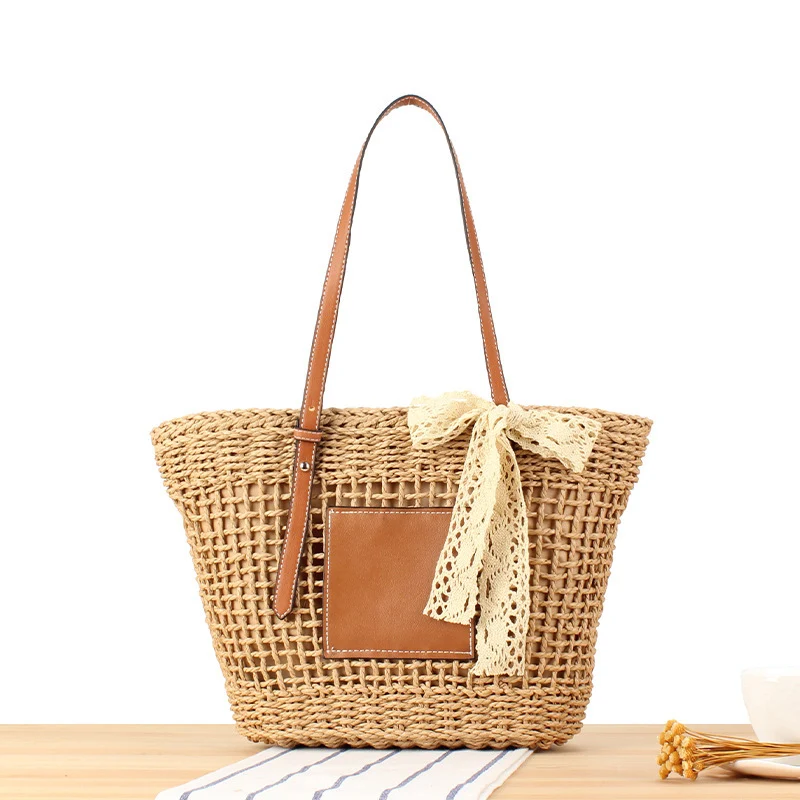 Eleganter gewebter Raffia-Korb mit Canvas-Akzent Skanto