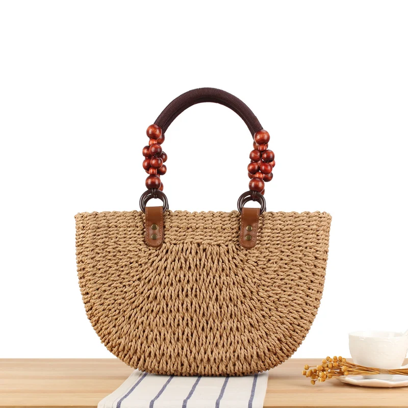 Handtasche mit dekorativen Holzperlen und Naturgeflecht Skanto