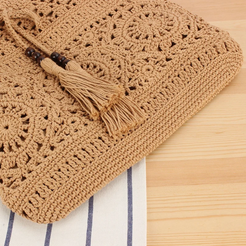 Kreative Makramee-Handtasche mit Fransen-Details Skanto