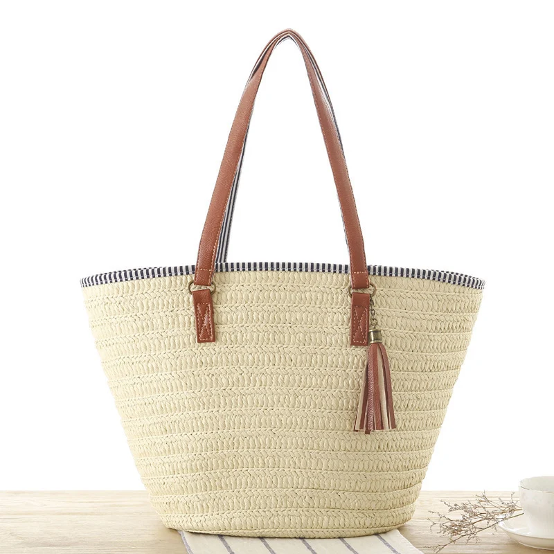 Geflochtene Strandtasche mit eleganten Ledergriffen Skanto