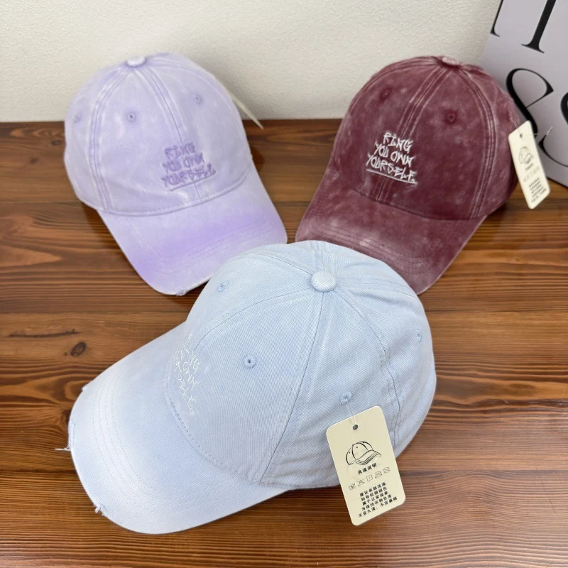 Damen Baseballkappe im Used-Look mit Motiv Skanto