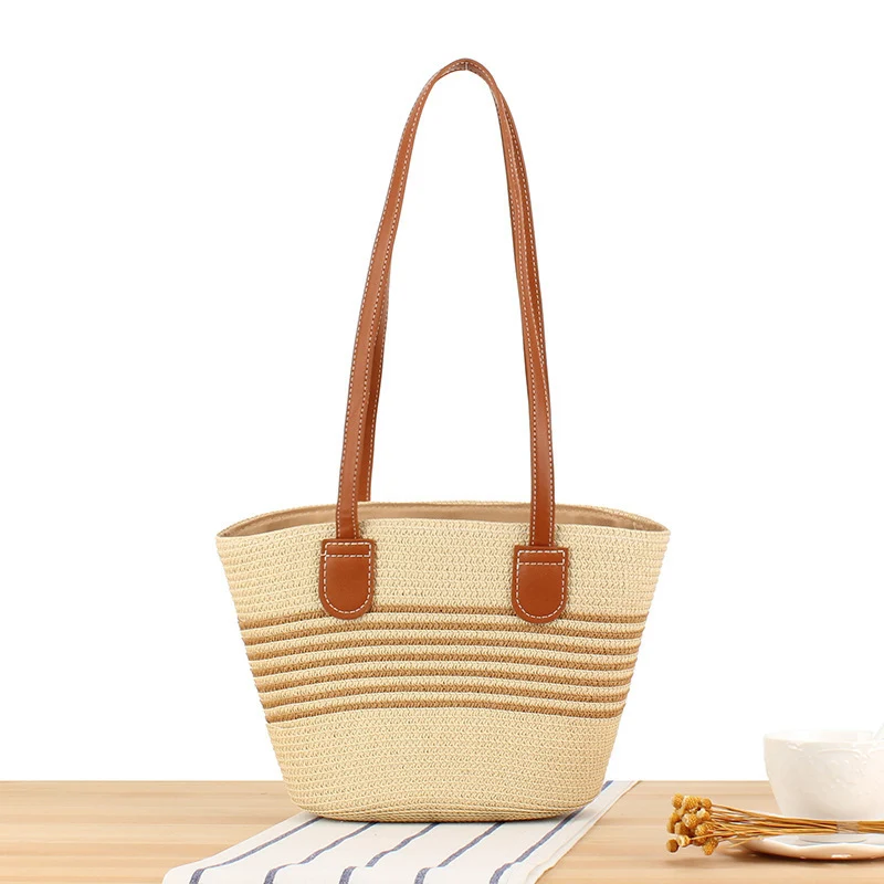 Strandtasche mit stilvollem Flechtdesign und hochwertigem Kunstledergriff Skanto