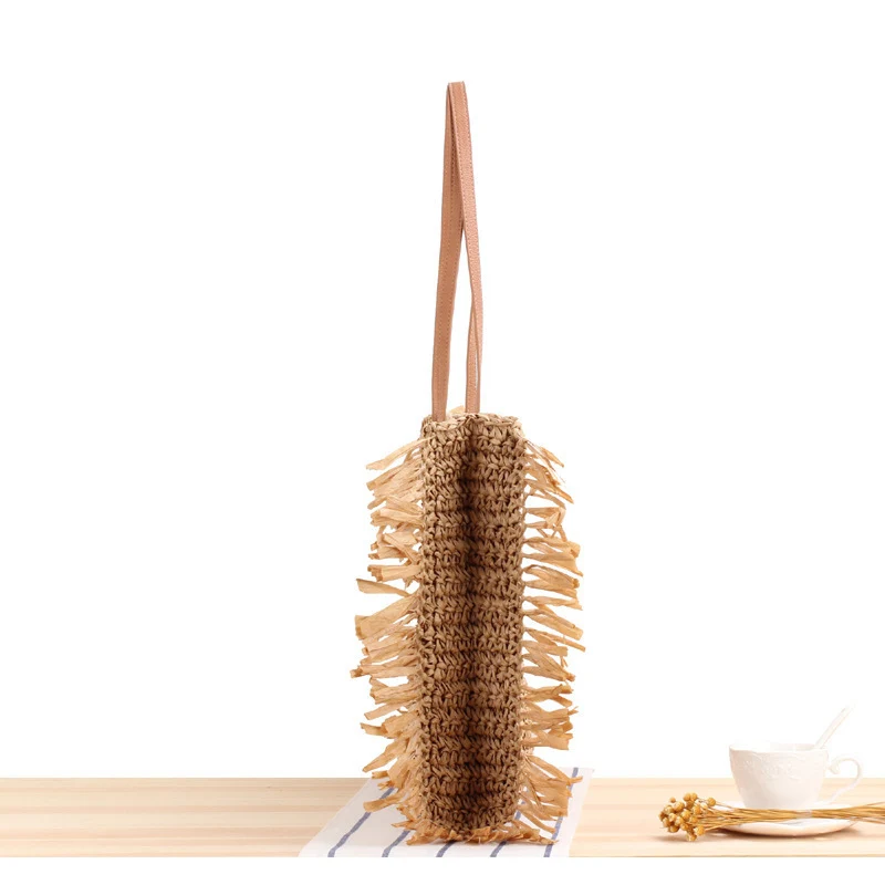 Strandtasche mit Fransen und robusten Ledergriffen Skanto