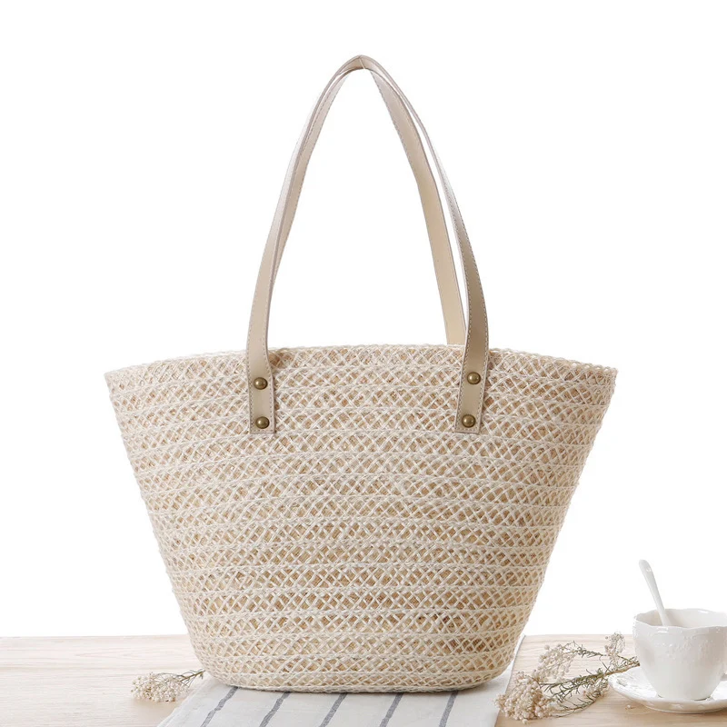 Strohtasche aus geflochtenem Material mit eleganter Schleifendekoration Skanto