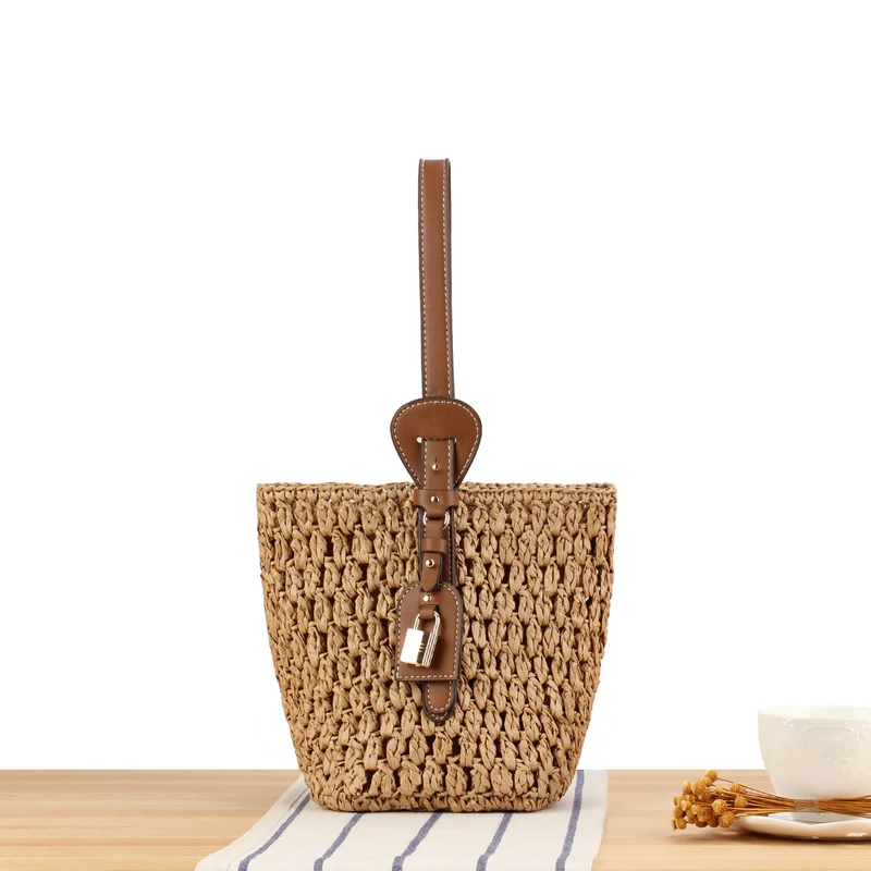 Geflochtene Stroh-Handtasche mit elegantem Lederbesatz Skanto