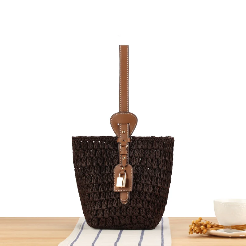 Geflochtene Stroh-Handtasche mit elegantem Lederbesatz Skanto
