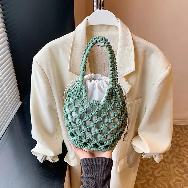 Moderne Handtasche aus gewebtem Material Skanto