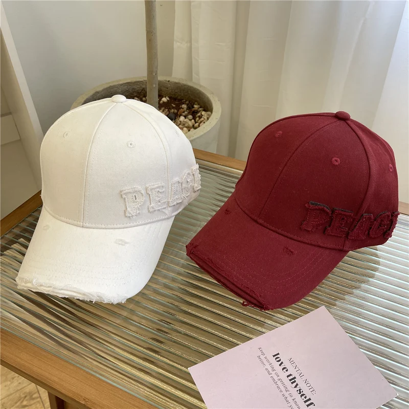 Damen Baseball Cap mit Peace-Grafik im Used-Look Skanto