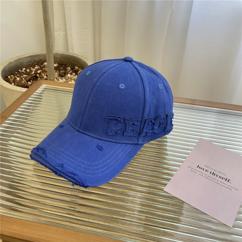 Damen Baseball Cap mit Peace-Grafik im Used-Look Skanto