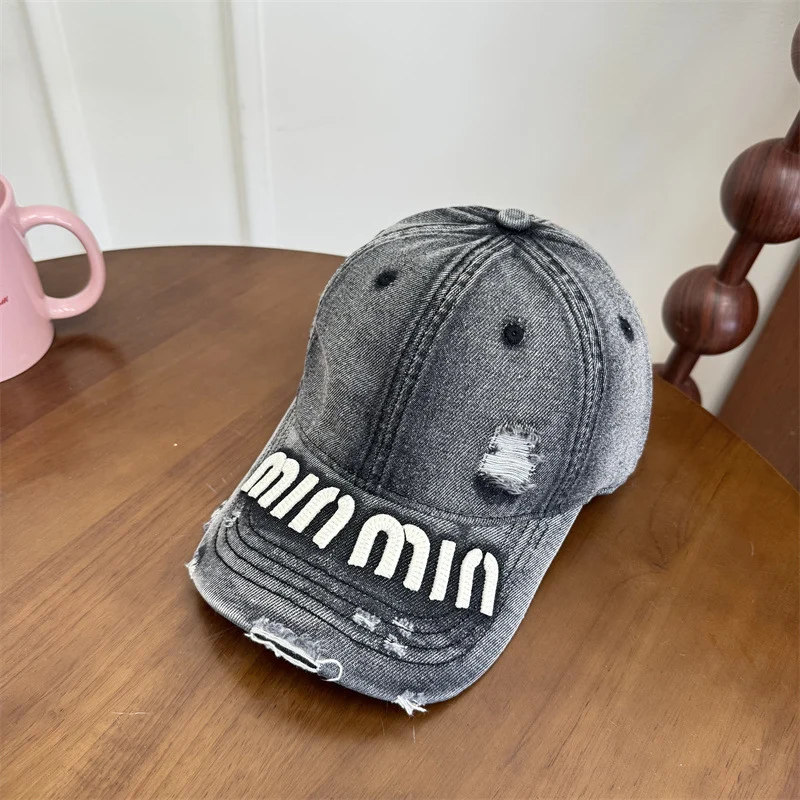 Damen Baseball Cap mit Grafik im Used-Look Skanto