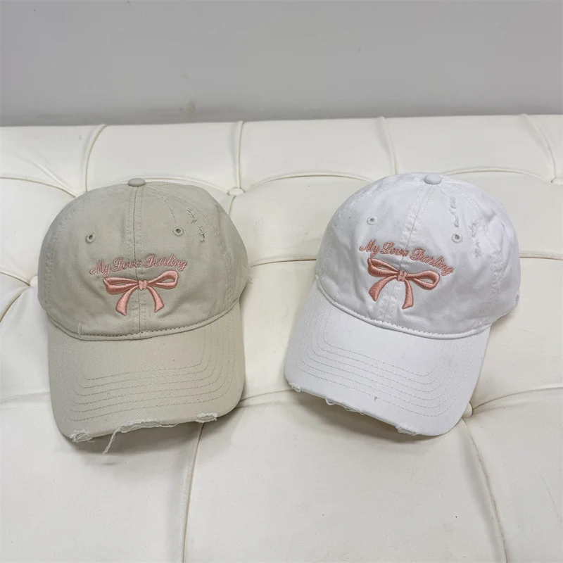 Damen Baseball Cap aus gewaschener Baumwolle mit Schleifenstickerei Skanto