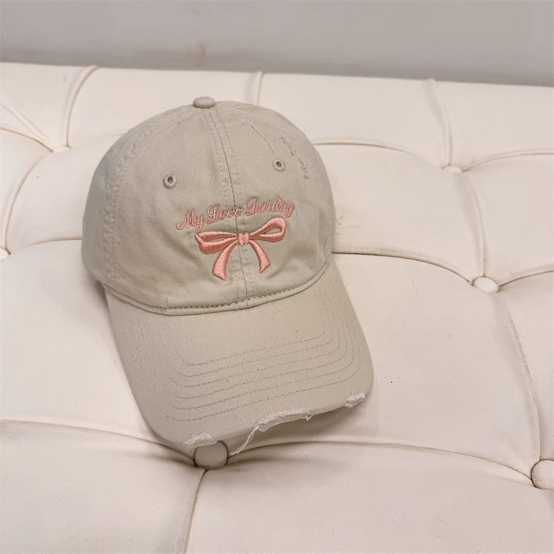 Damen Baseball Cap aus gewaschener Baumwolle mit Schleifenstickerei Skanto
