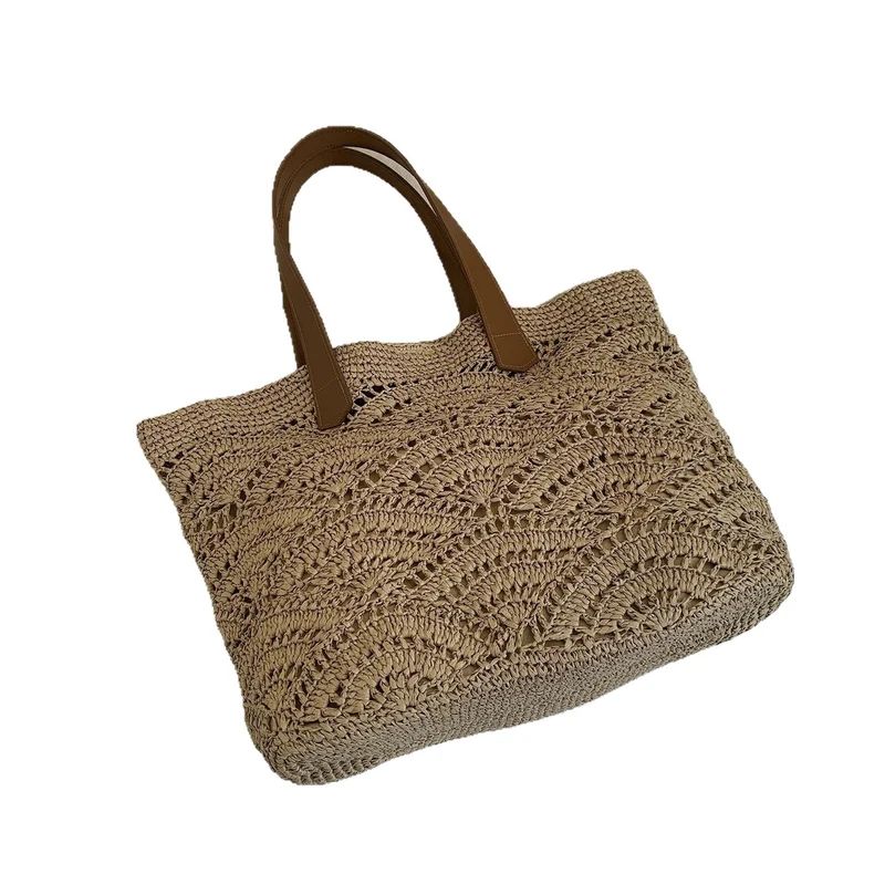 Handtasche aus hochwertigem gewebtem Naturmaterial mit eleganten Ledergriffen Skanto