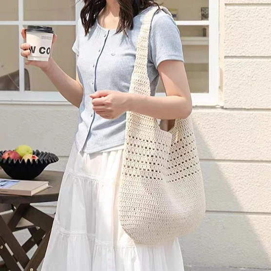 Handtasche aus handgehäkelten Naturmaterialien Skanto