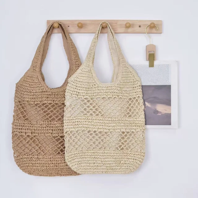 Handtasche aus gewebtem Naturmaterial mit Quastendetails Skanto