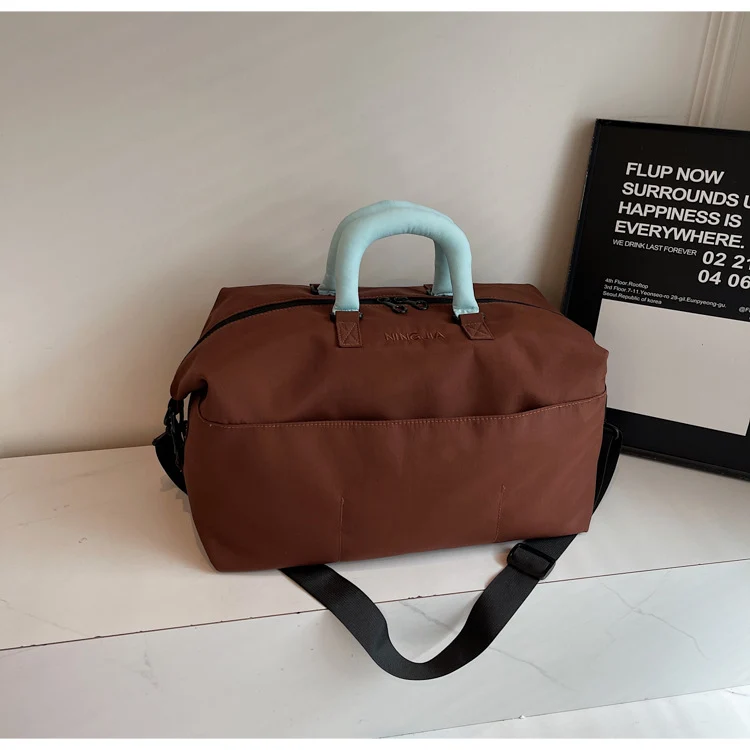 Sportliche Reisetasche für Damen mit ergonomischen Griffen und variabler Fächeraufteilung Skanto