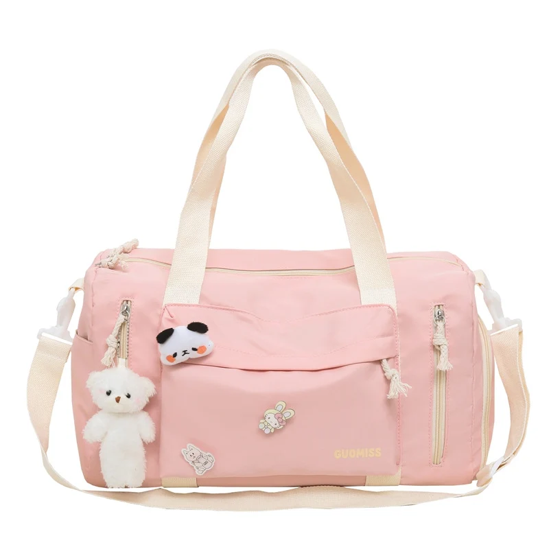 Skanto Damen Sport-Reisetasche mit verspielten Anhängern Skanto