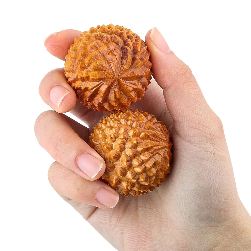 Holzkugeln zur Hand- und Fingermassage
